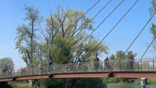 People walking on a bridge. Eventi SPF Settembre 2026
