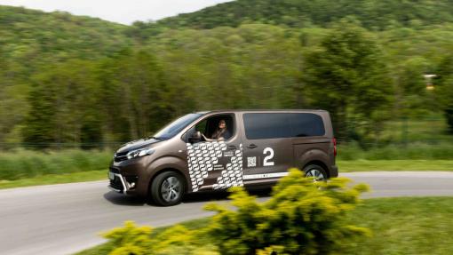 A van on route to pick up passangers.