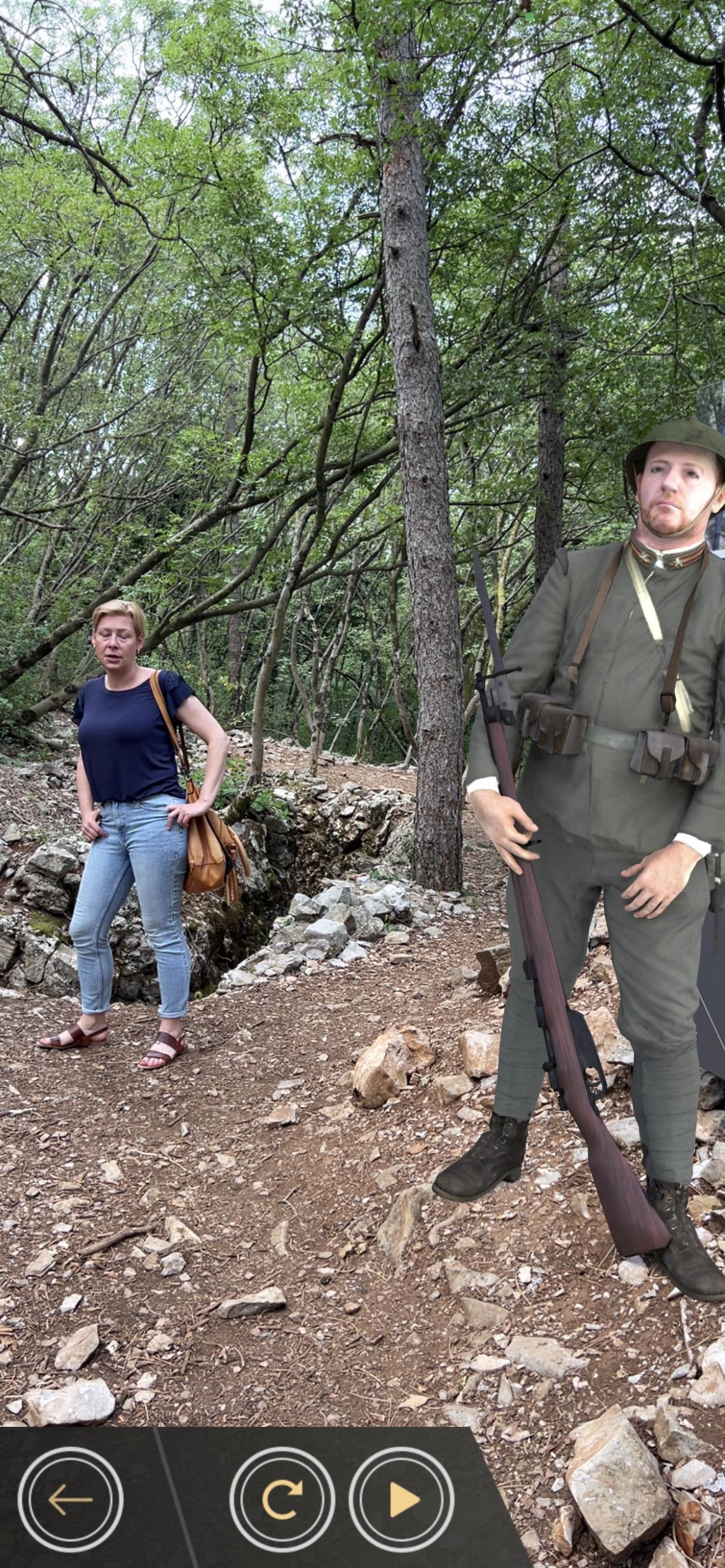 Real person and AR image of a soldier standing next to a trench.